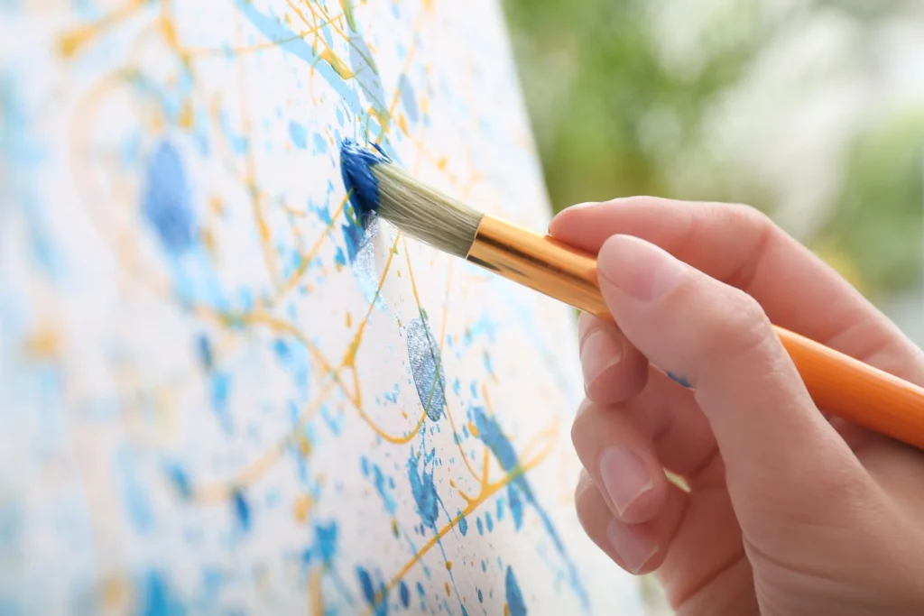 artist-painting-on-canvas-with-brush-closeup-2026-01-30-19-57-38-utc